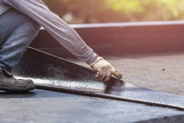 Professional Basement Waterproofing technician working in Brunswick, GA